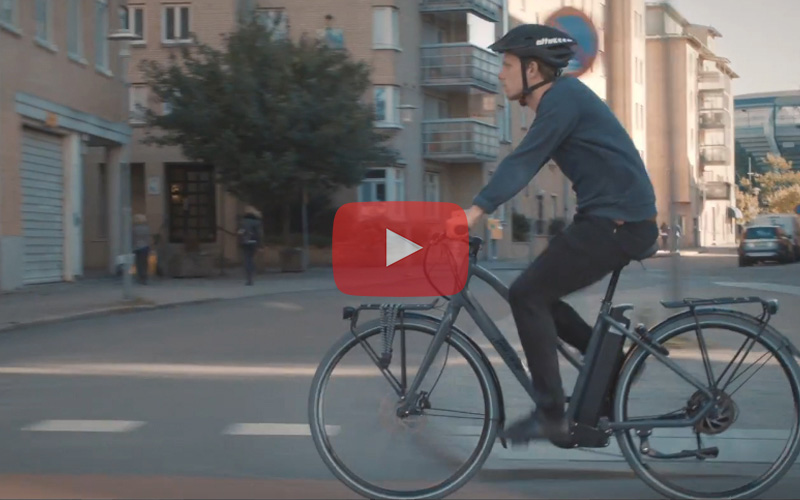 EcoRide electric bike cycling to work
