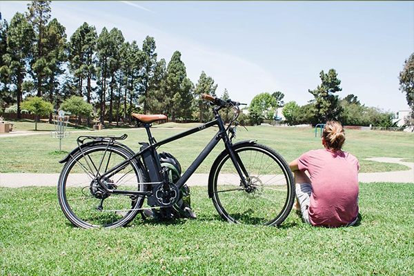 Man relaxing outside after cycling